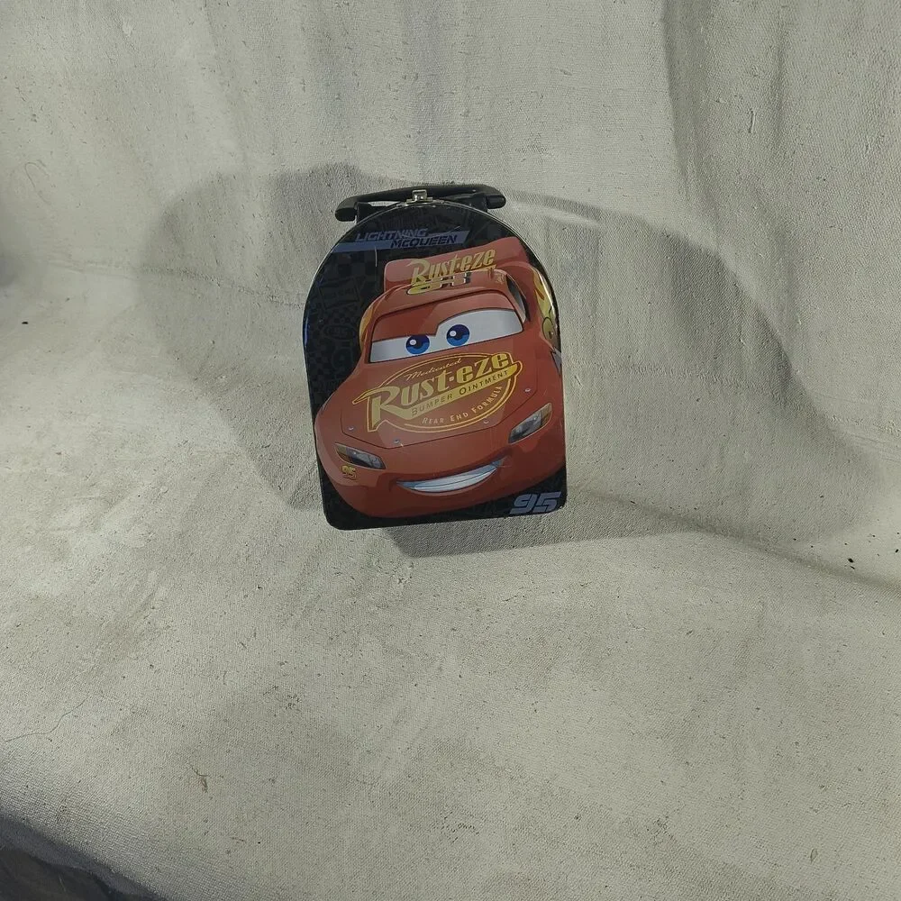 Metal lunch box featuring Lightening Mcqueen by Disney Pixar Cars